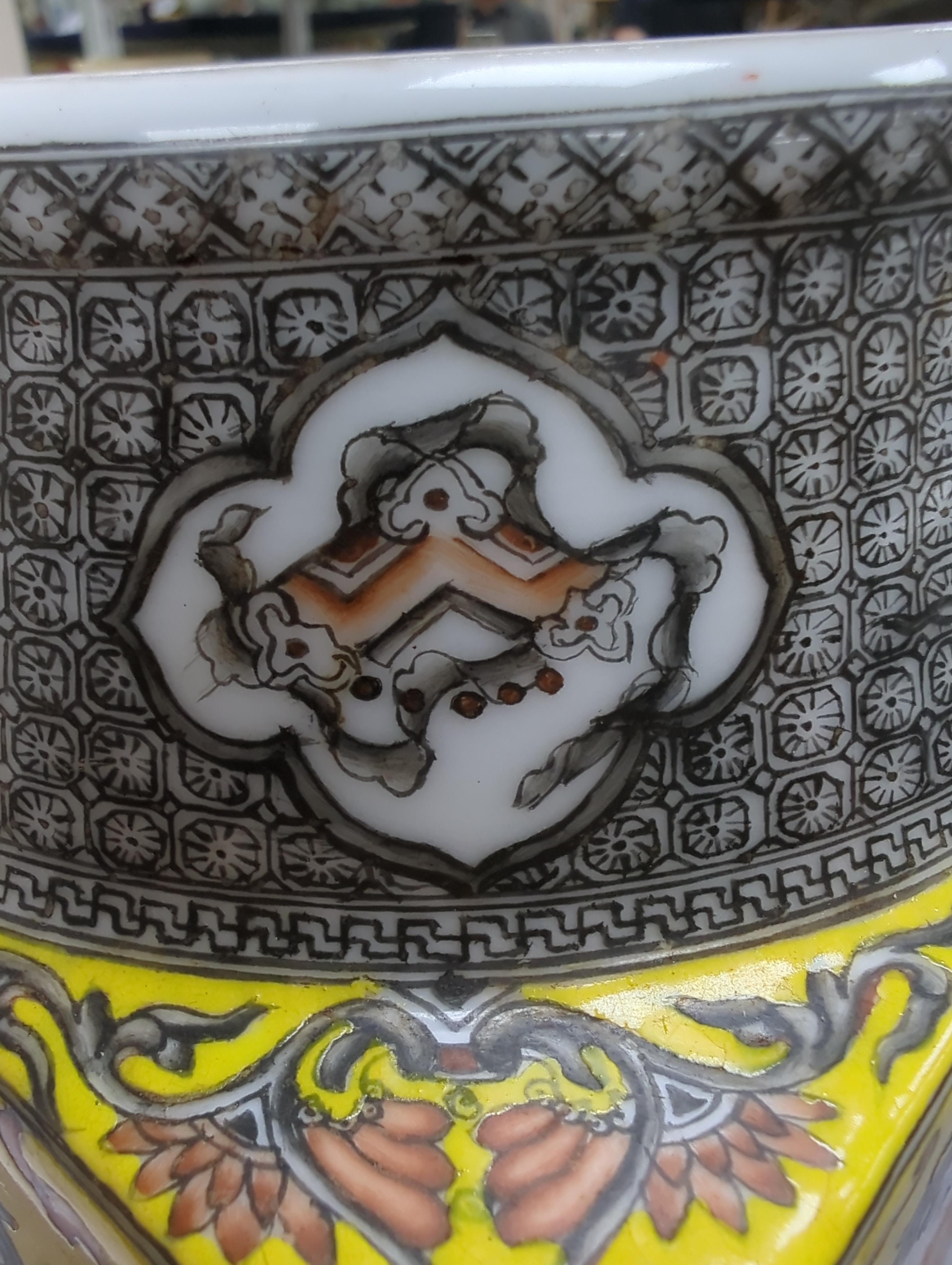 A Chinese enamelled porcelain cong-shaped vase, decorated with dragons chasing the flaming pearl, 29cm high